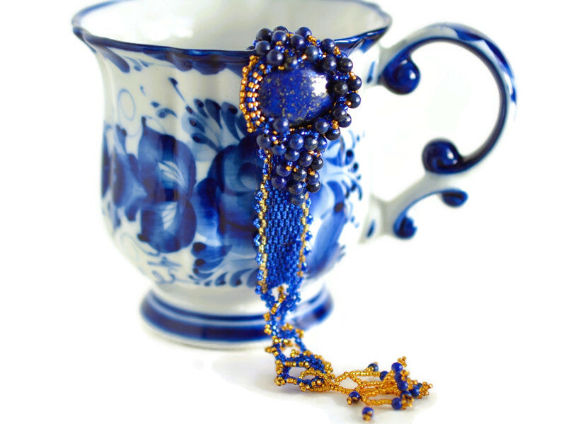 Bead-woven-gold-blue-bracelet 