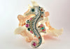bead embroidered silver seahorse pendant