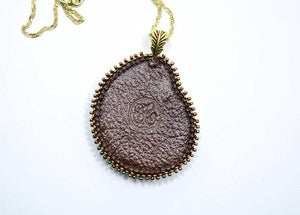 handcrafted bead embroidered brown bronze ammonite jewelry