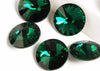 Emerald  rivoli 14 mm in settings 