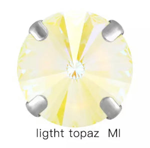 light topaz rivoli 14 mm in settings