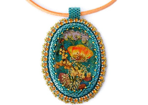 bead embroidery pendant with dry flowers in resin