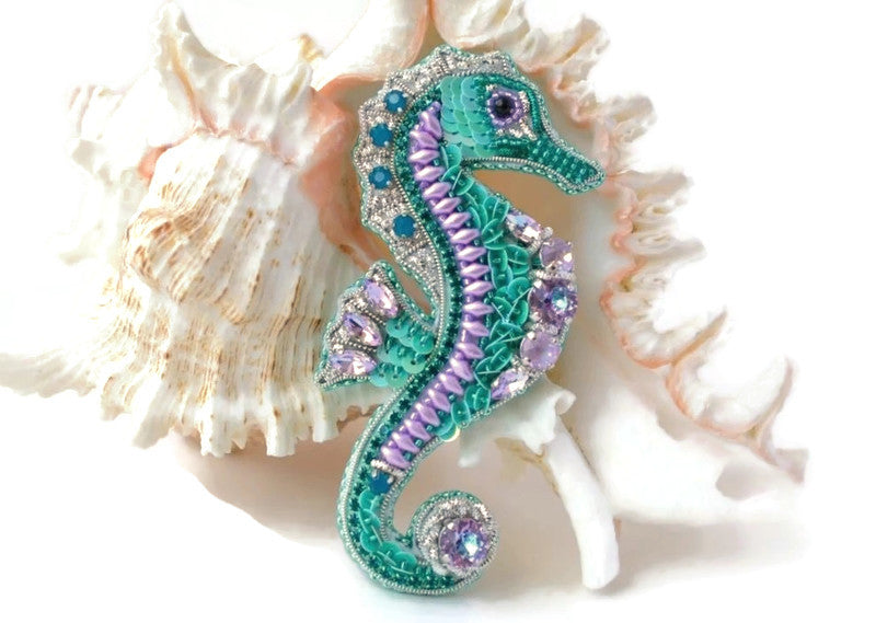 bead embroidered teal lilac seahorse pin