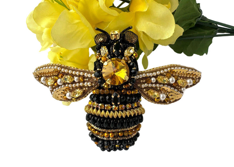 Bee-shaped brooch with gemstones 