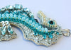 bead embroidered blue seahorse necklace