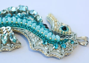 bead embroidered blue seahorse necklace