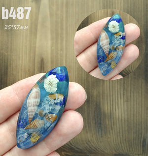 seashells in resin cabochons for jewelry making