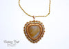 handmade bead embroidered agate heart pendant