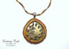 handcrafted bead embroidered brown bronze fossil jewelry