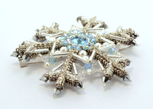 bead woven snowflake brooch silver