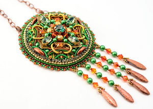 handmade green orange bead embroidered dreamcatcher necklace