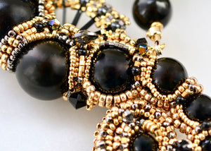 black gold beaded seahorse necklace