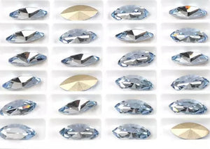 light sapphire crystal navette in settings 5x10 mm