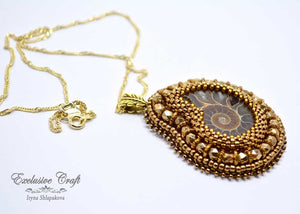 handcrafted bead embroidered brown bronze ammonite pendant