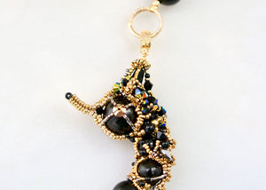 black gold beaded seahorse necklace